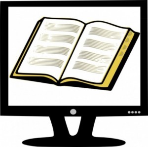 Monitor con libro abierto